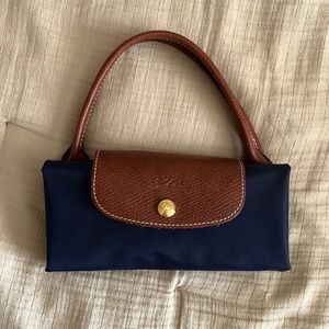 Longchamp Le Pilage Navy Open Tote.Tote is “never full” with only snap closure.